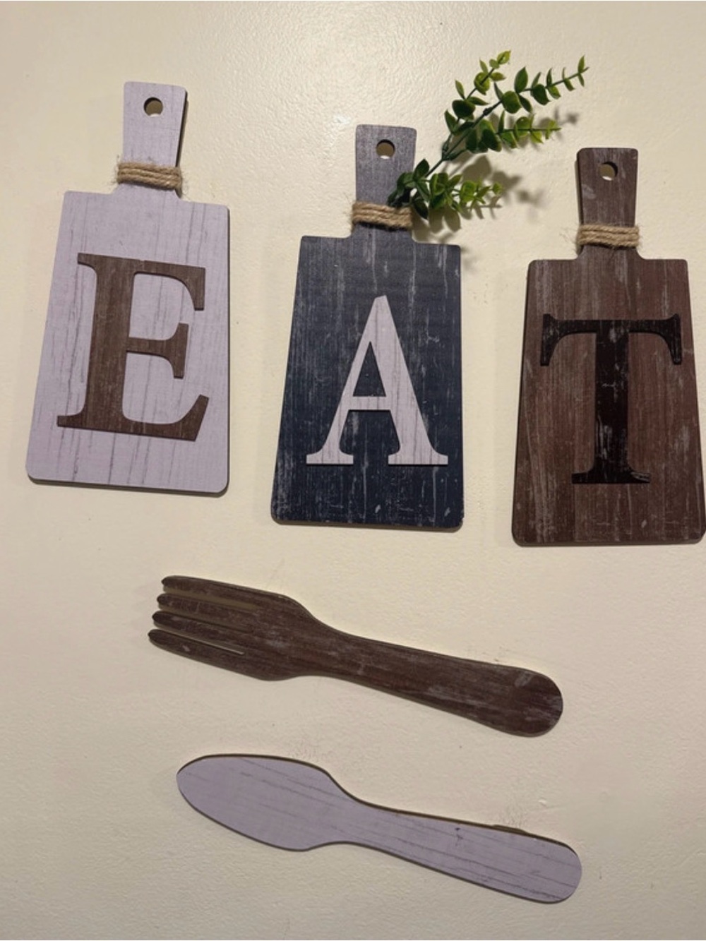 Kitchen decor cutting board with fork and spoon